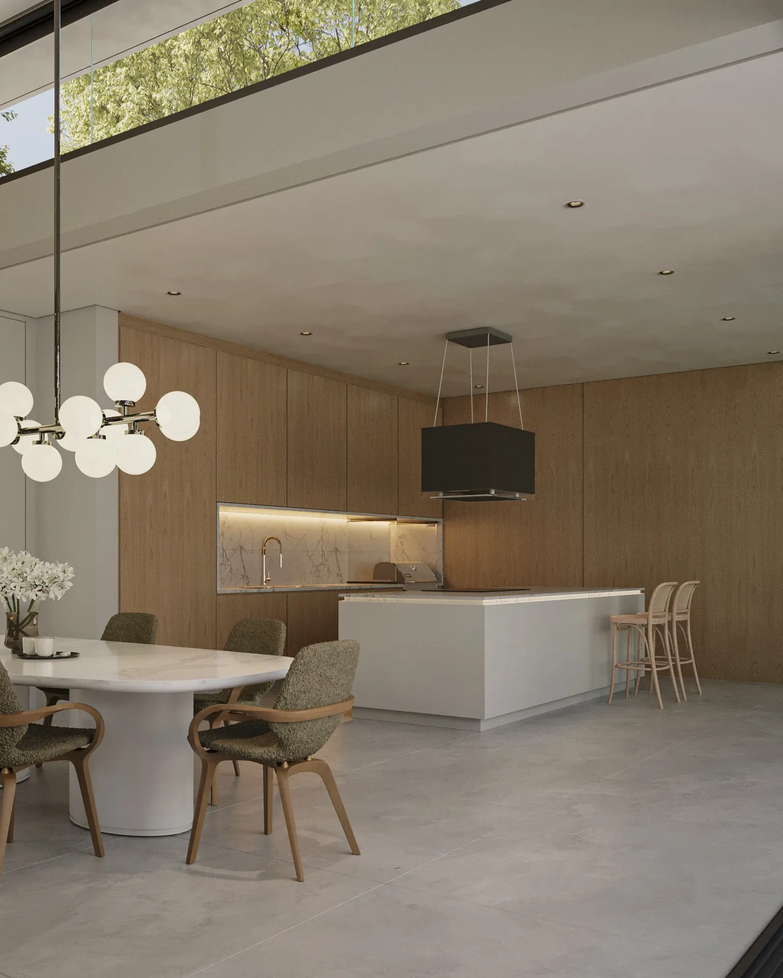 Cozinha e sala de jantar integradas, com lustre esférico sobre a mesa