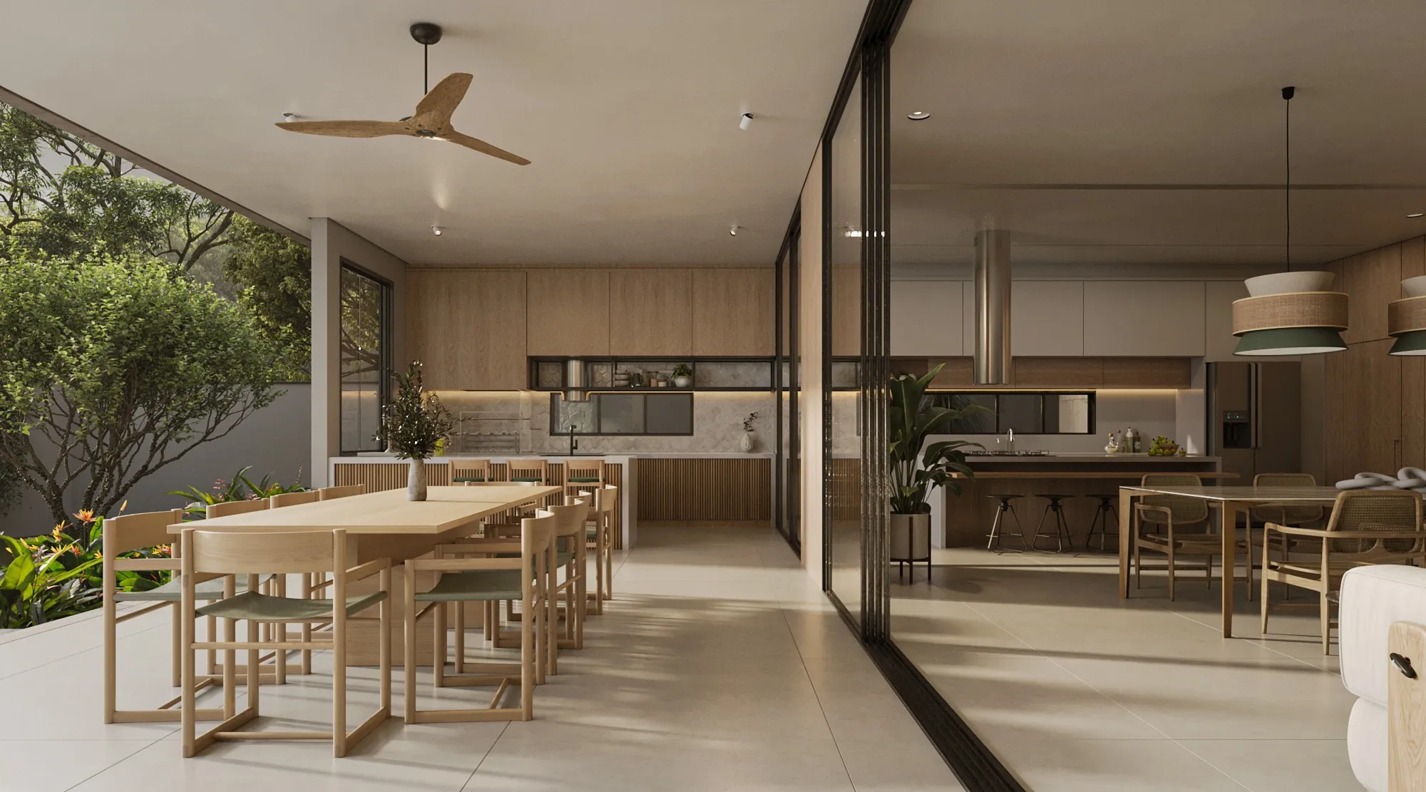 Estar e jantar integrados, com a cozinha ao fundo e vão aberto para o jardim