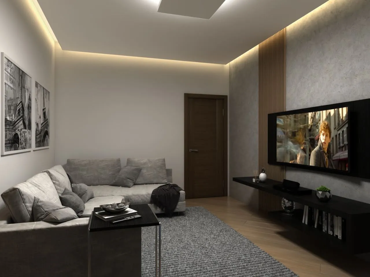 Sala de TV com sofá em L, painel de madeira e iluminação indireta