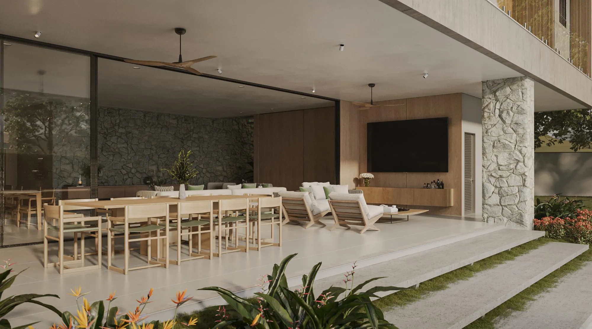 Varanda gourmet aberta para o jardim, com mesa longa de madeira